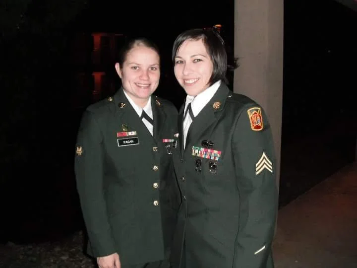 Tania with a fellow soldier in uniform at night